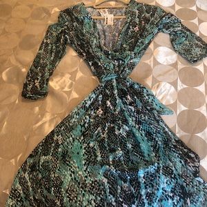 Long sleeve large semi wrap dress in mint blue.